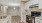 a kitchen with white cabinets