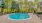 a swimming pool in a backyard