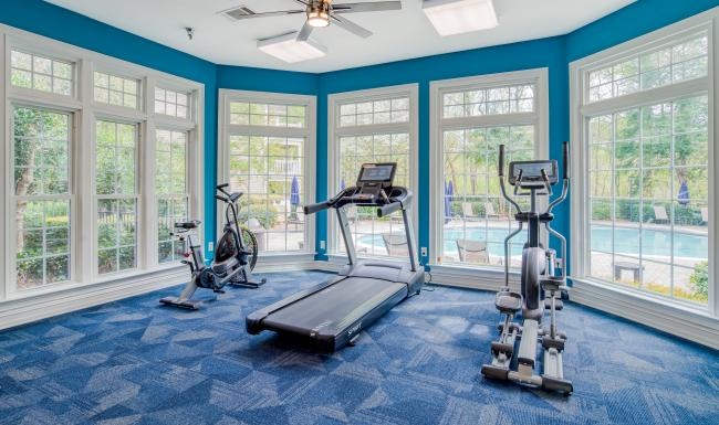Get your workout on a room with exercise equipment